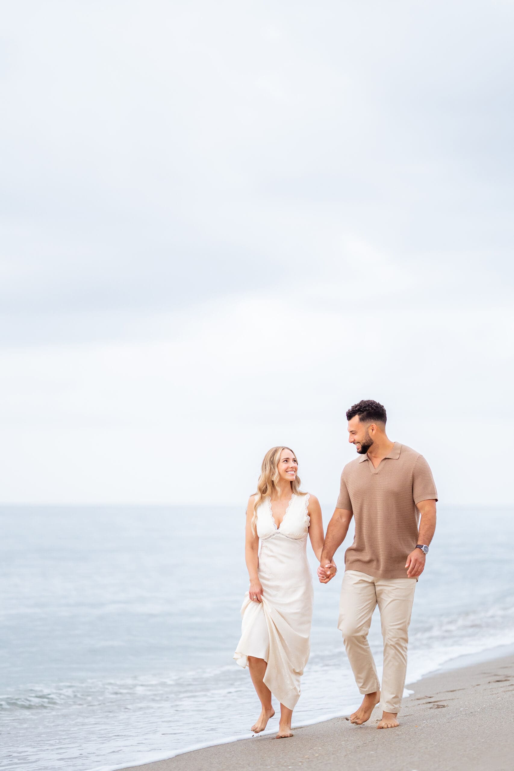 Couple walking along beach