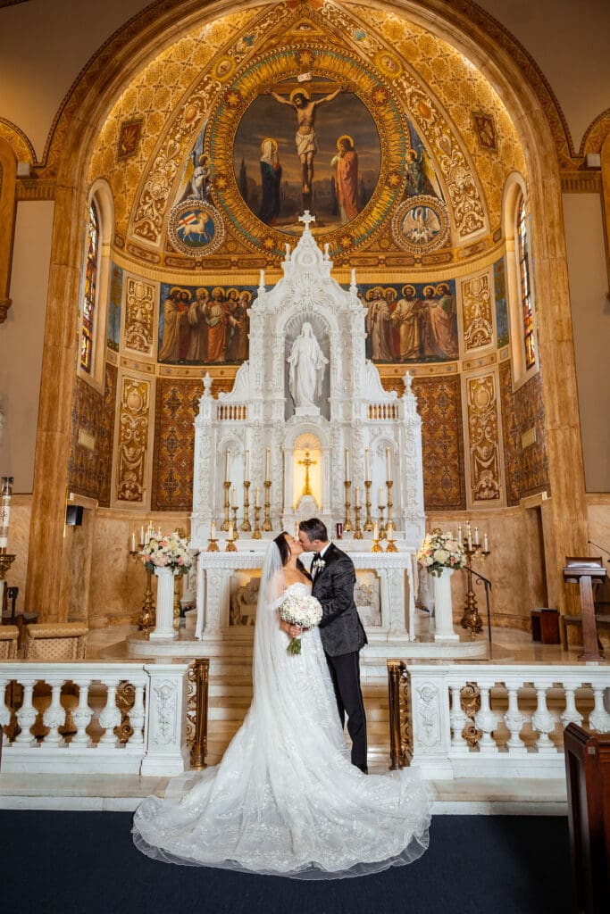 Bride and groom portraits at St Edwards Catholic Church Palm Beach